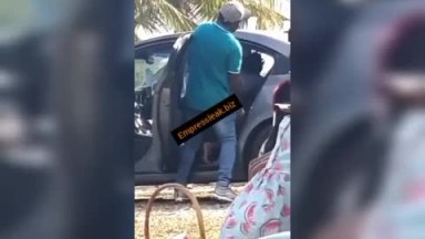 Fucking in a car in front of crowd